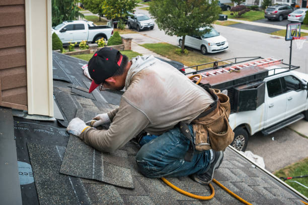 Professional Roof Replacement technician working in Candia, NH